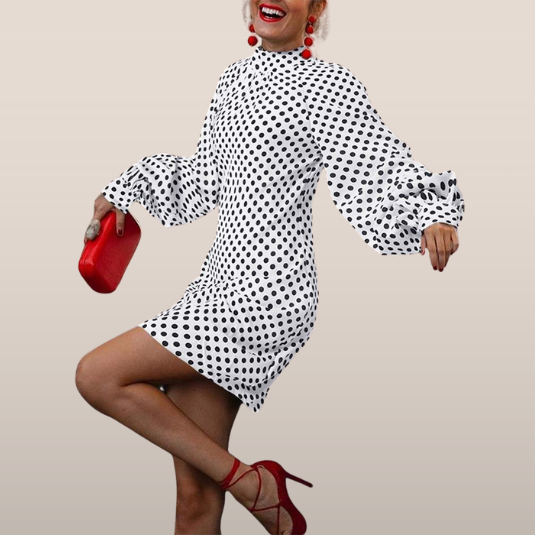 Mirella – polkadotjurk met ballonmouwen en hoge halslijn