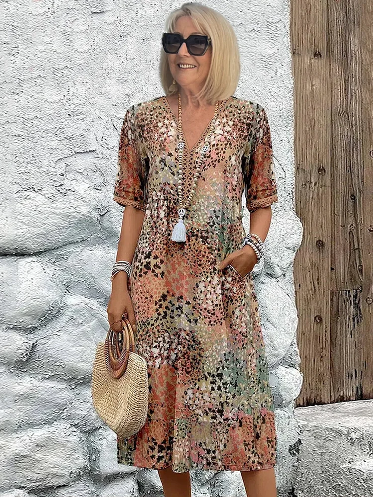 Isla – Midi-jurk met bloemenprint en V-hals
