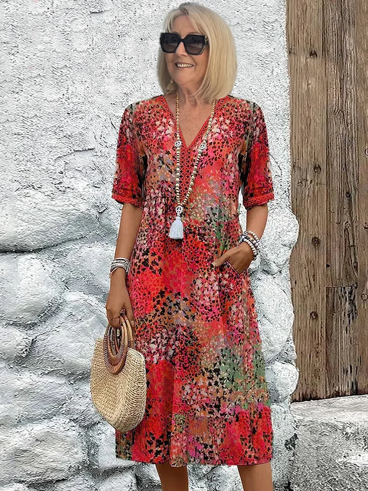Isla – Midi-jurk met bloemenprint en V-hals