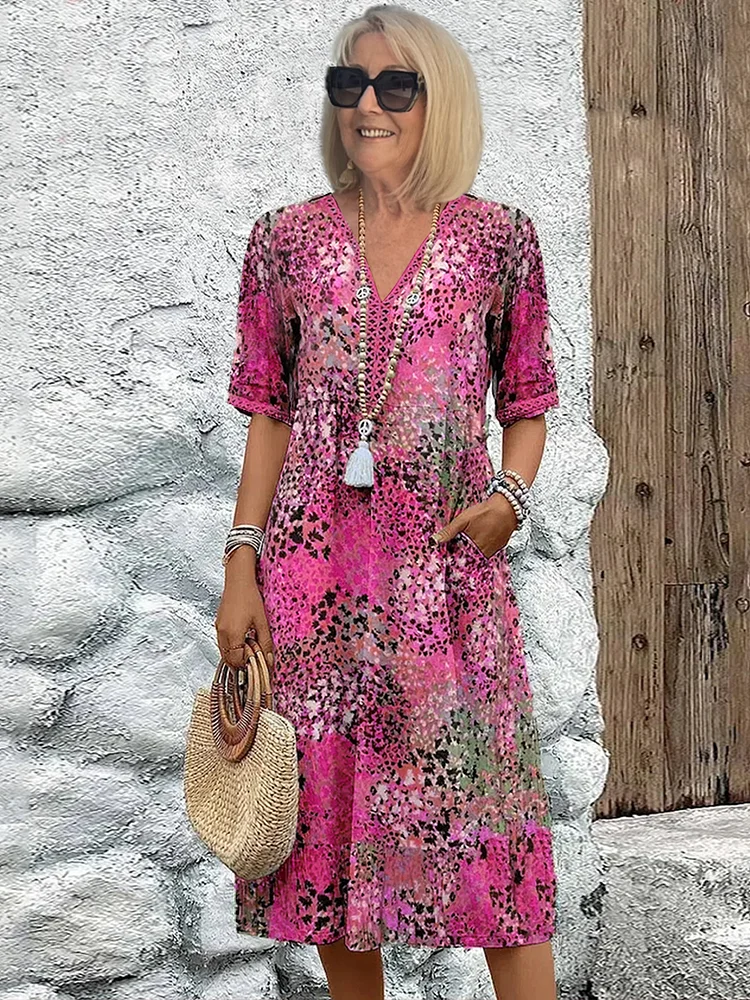Isla – Midi-jurk met bloemenprint en V-hals