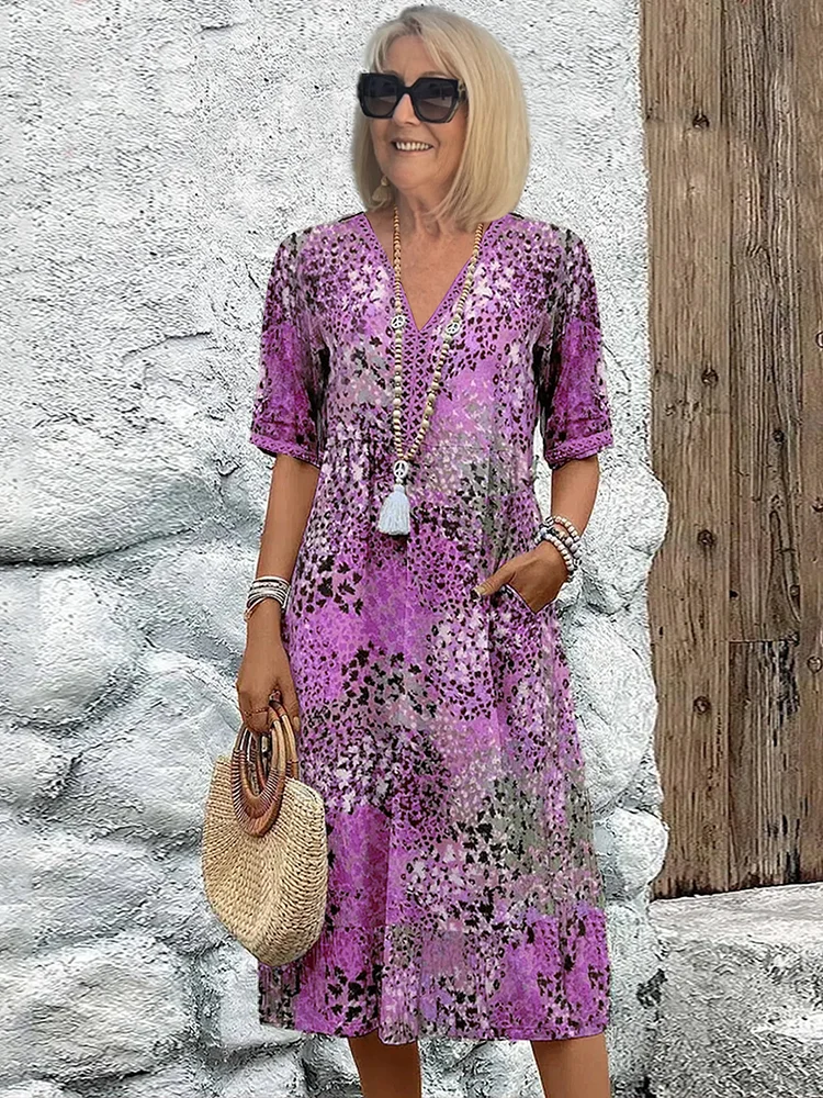 Isla – Midi-jurk met bloemenprint en V-hals