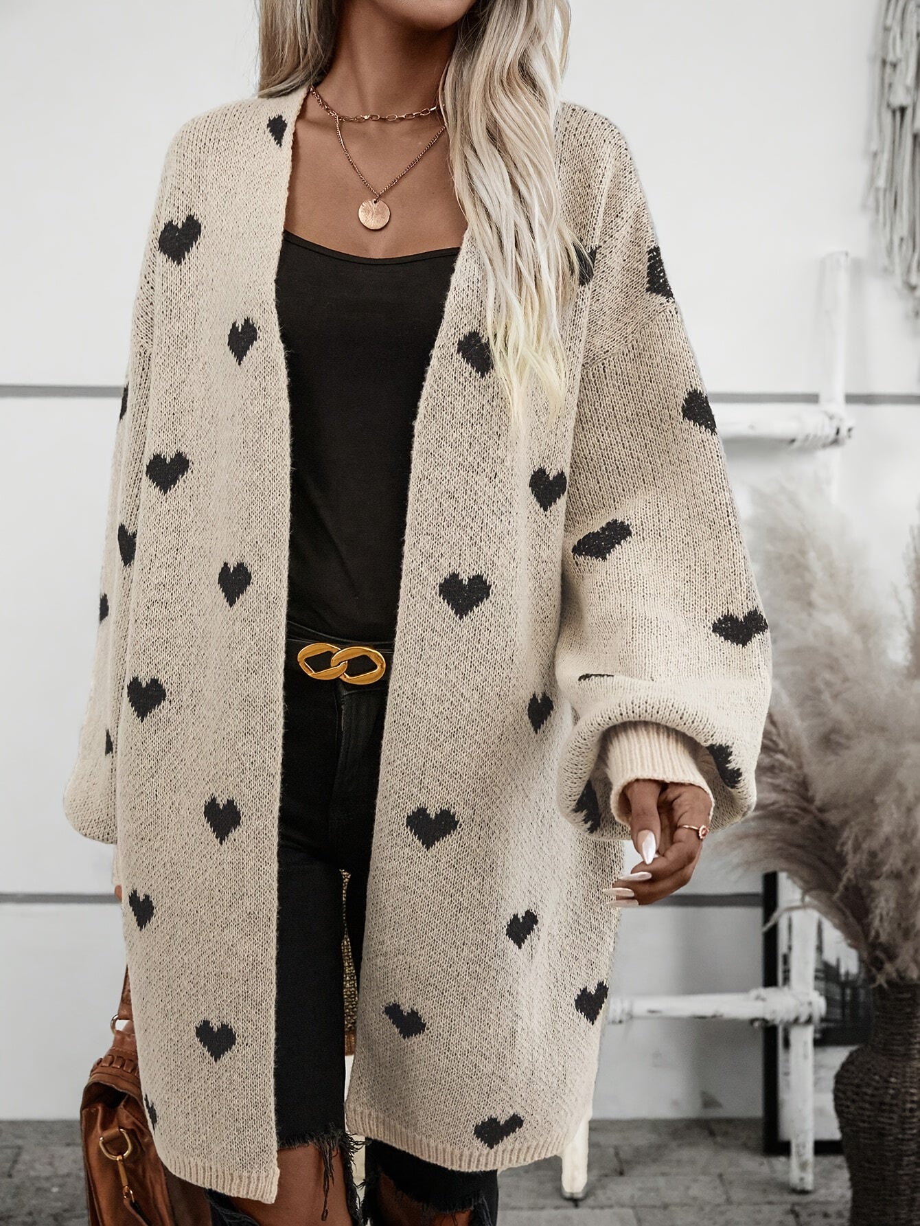 Lana – gebreide cardigan vest met hartjesmotief en knoopsluiting