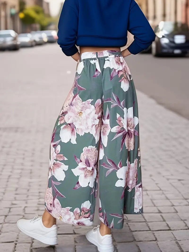 Aisling – Bloemenprint, hoge taille, wijde palazzo-broek met strikceintuur