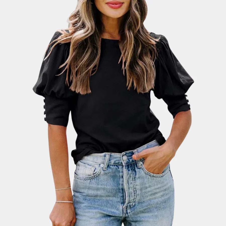 Tess – Oversized viscose blouse met en V-hals en plofmouwen