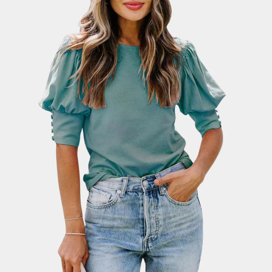 Tess – Oversized viscose blouse met en V-hals en plofmouwen