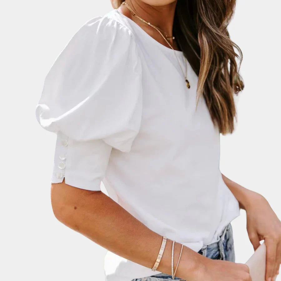 Tess – Oversized viscose blouse met en V-hals en plofmouwen