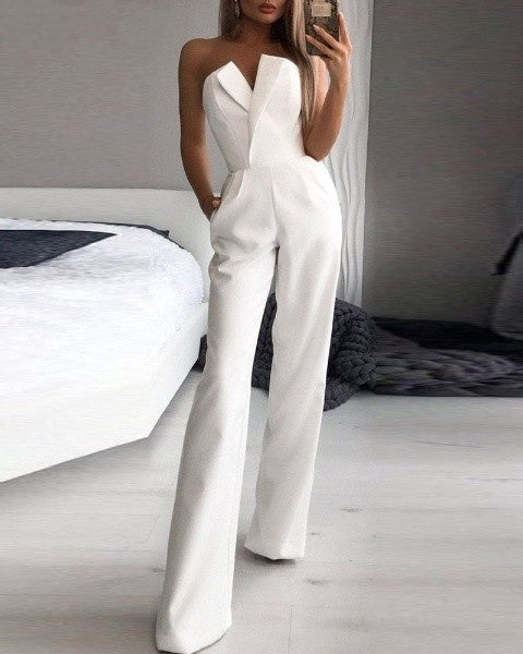 Lynn – Zwarte strapless jumpsuit met wijde pijpen en asymmetrisch bustdetail