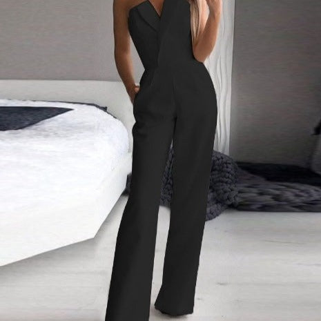 Lynn – Zwarte strapless jumpsuit met wijde pijpen en asymmetrisch bustdetail