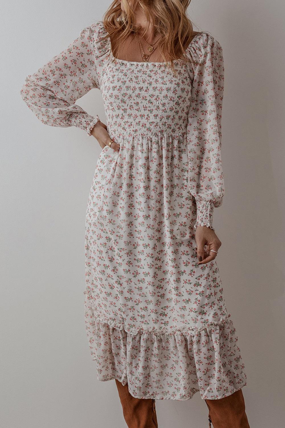 Liora – Casual-formele midi jurk met romantische ruches en flatterende pasvorm