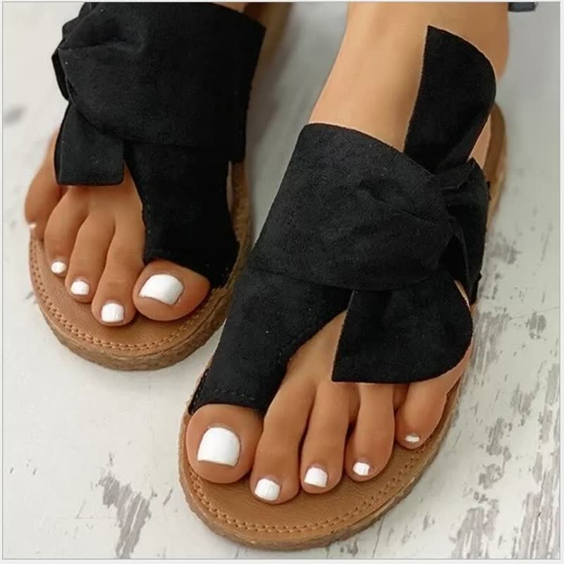 Romy – slippers met gevlochten band en zacht voetbed