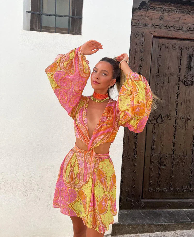 Elina – Mini zomerjurk met boho-print en open rug