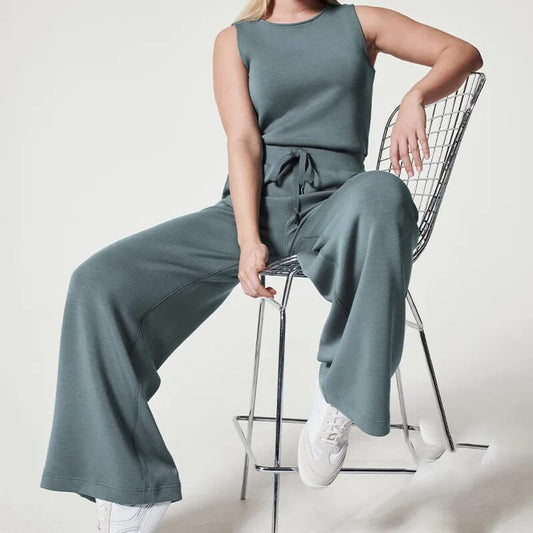 Thalia – kanten jumpsuit met wijde pijpen en getailleerd model