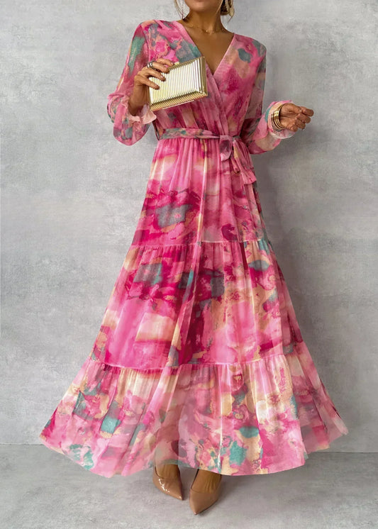 Mila – Roze bloemen maxi jurk met lange mouwen en wikkelmodel