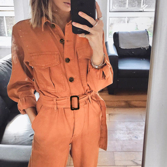Tessa – Oranje utility jumpsuit met ceintuur en losse pasvorm