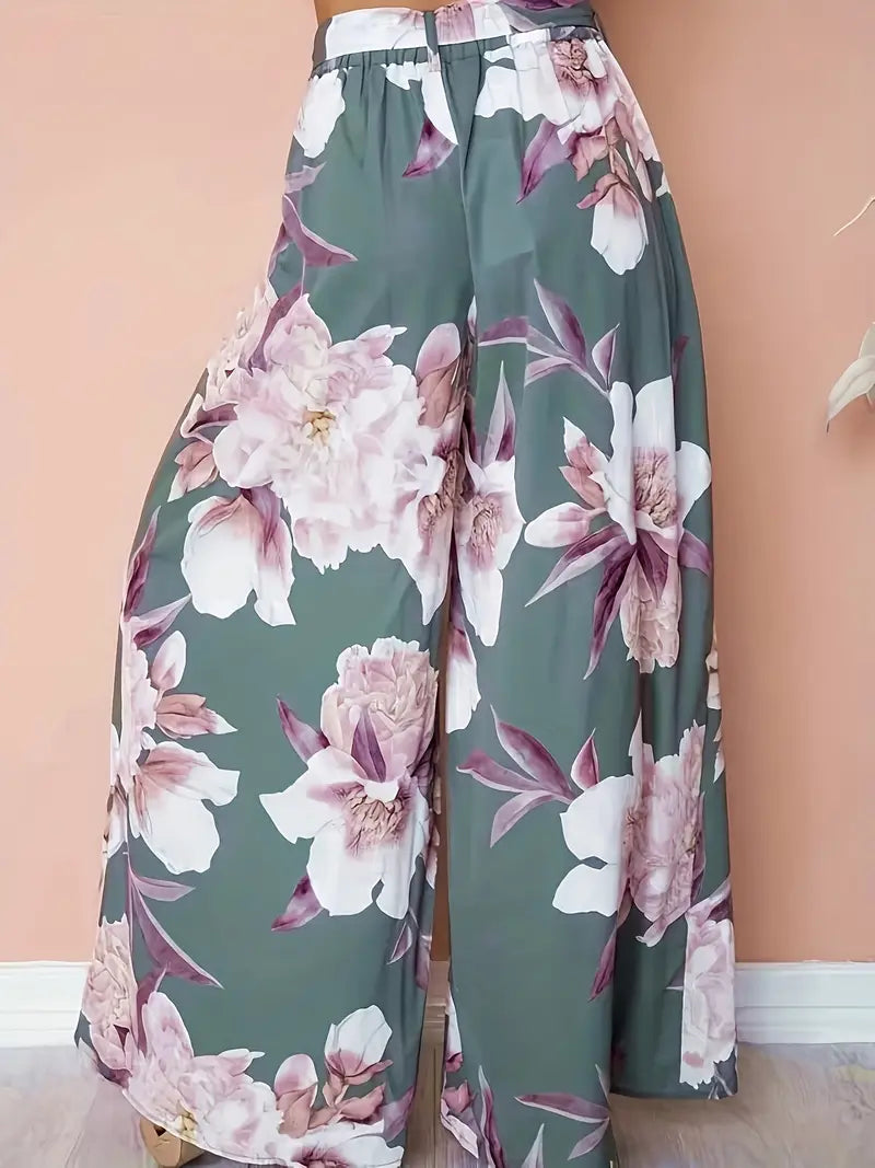 Aisling – Bloemenprint, hoge taille, wijde palazzo-broek met strikceintuur