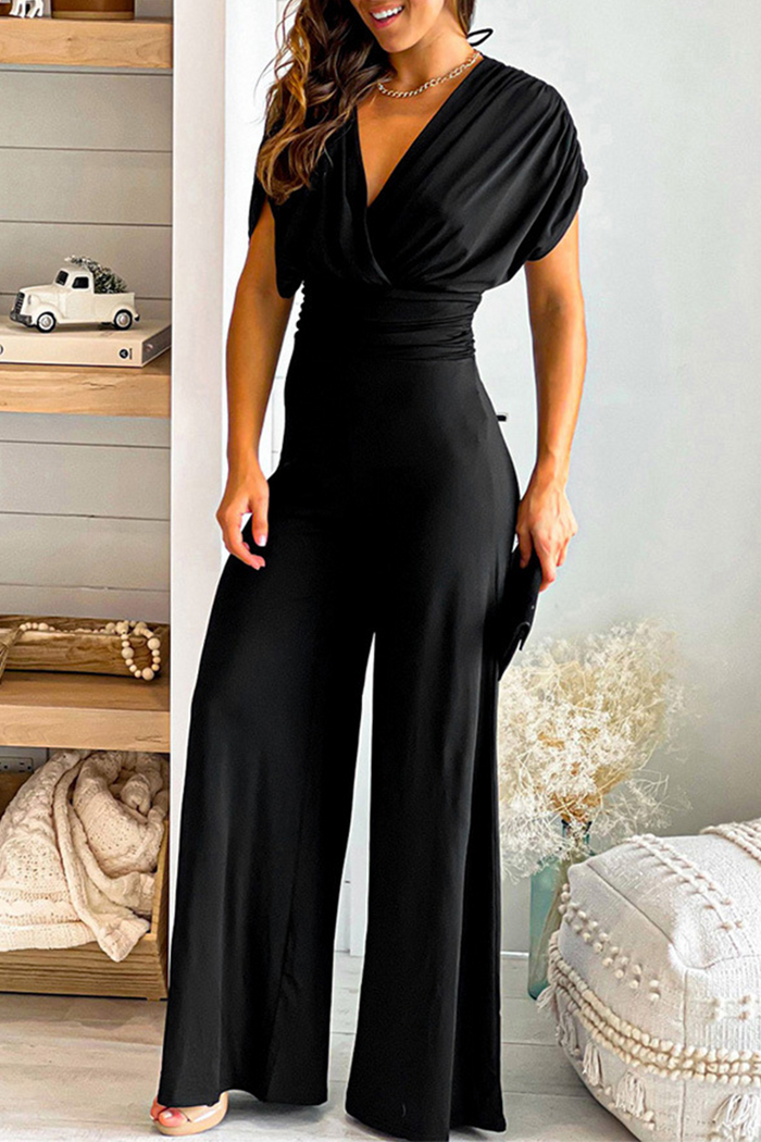 Noa  – Backless jumpsuit met strakke lijnen en wijde pijpen