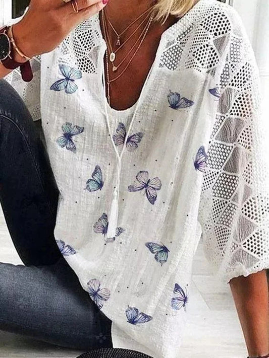 Angela – zomer blouse van viscose met knoopdetail aan de mouw