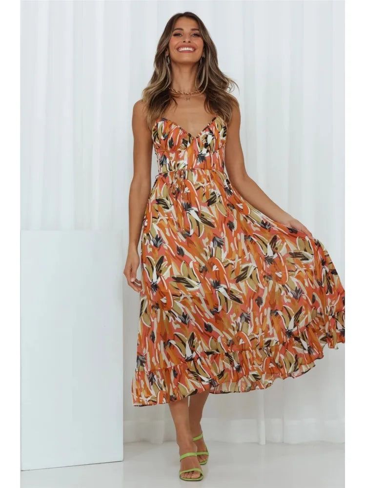 Faelia – Midi-jurk met kleurrijke print en korte mouwen