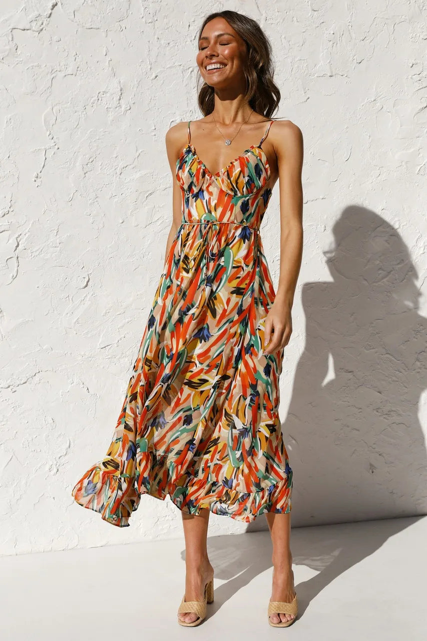 Faelia – Midi-jurk met kleurrijke print en korte mouwen