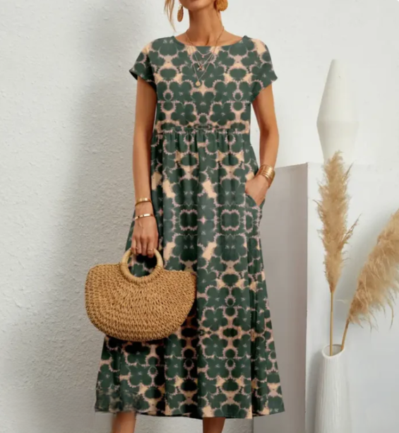 Virginia Bloom – Lichte midi-jurk met kleurrijke bloemenprint en A-lijn rok