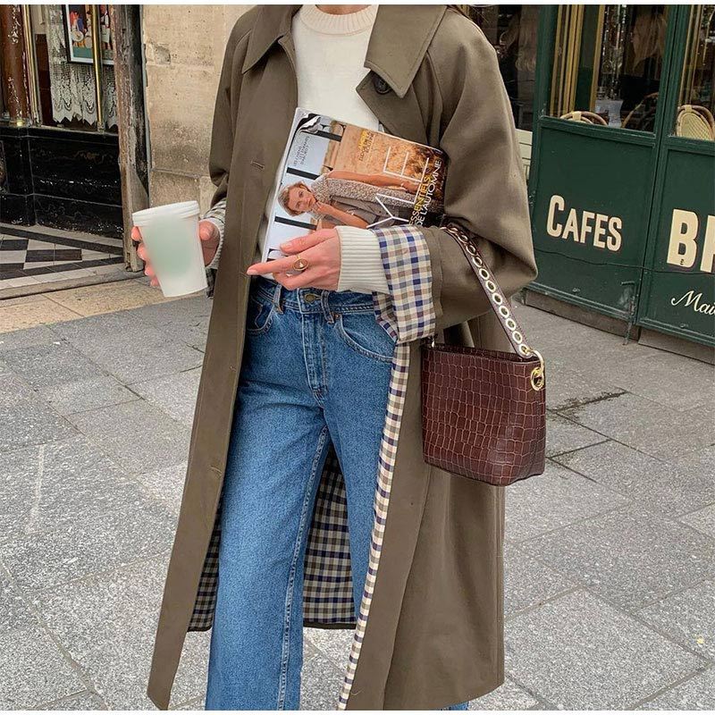 Noa – lange trenchcoat met ruitvoering en getailleerde pasvorm