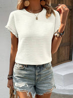 Rib top met ronde hals en korte mouwen met rucherand