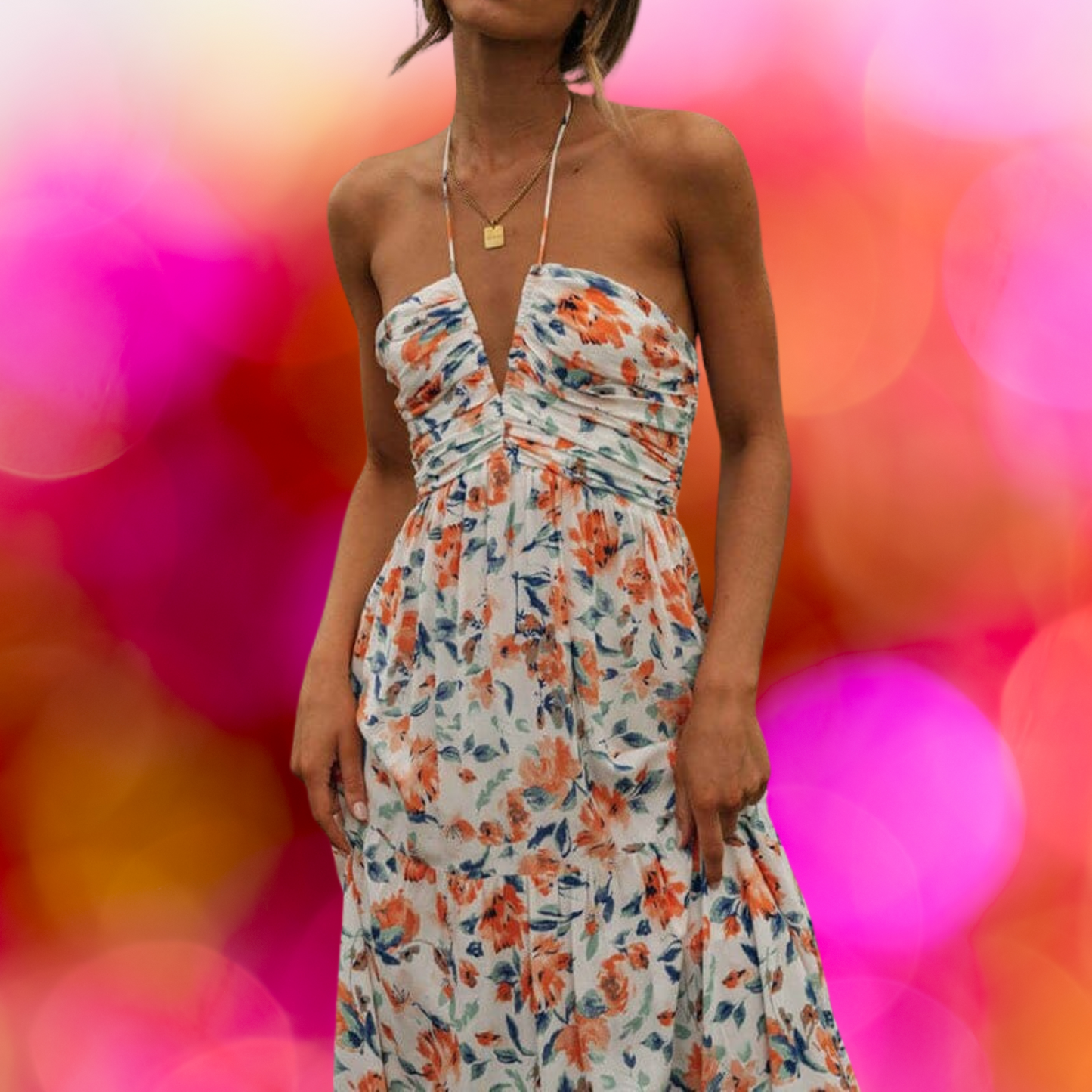 Elionora – Chiffon zomerjurk met V-hals en oranje bloemenprint