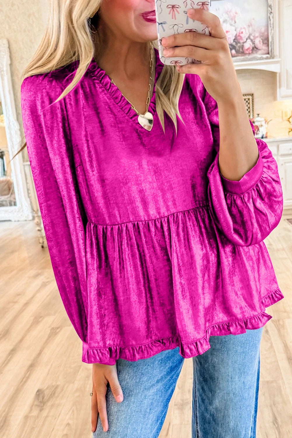 Glanzende blouse met V-hals en peplum model