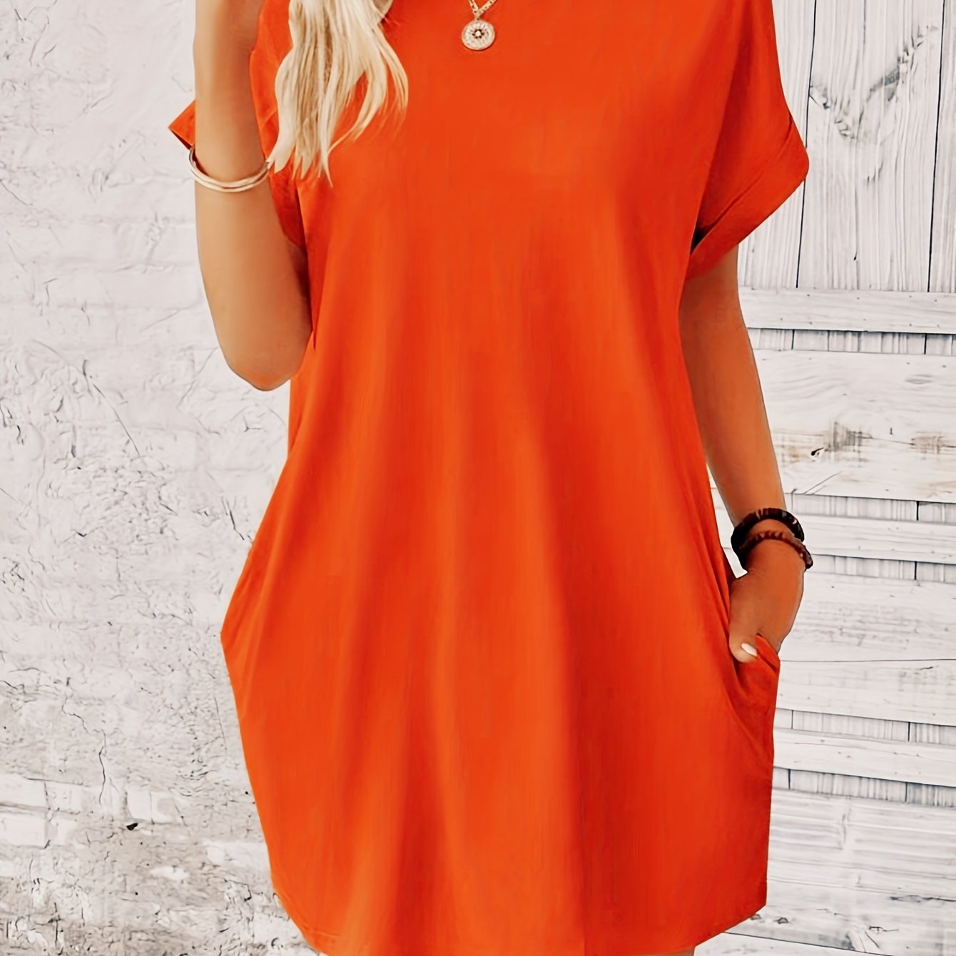 Lina – midi zomer jurk met ronde hals en handige zakken