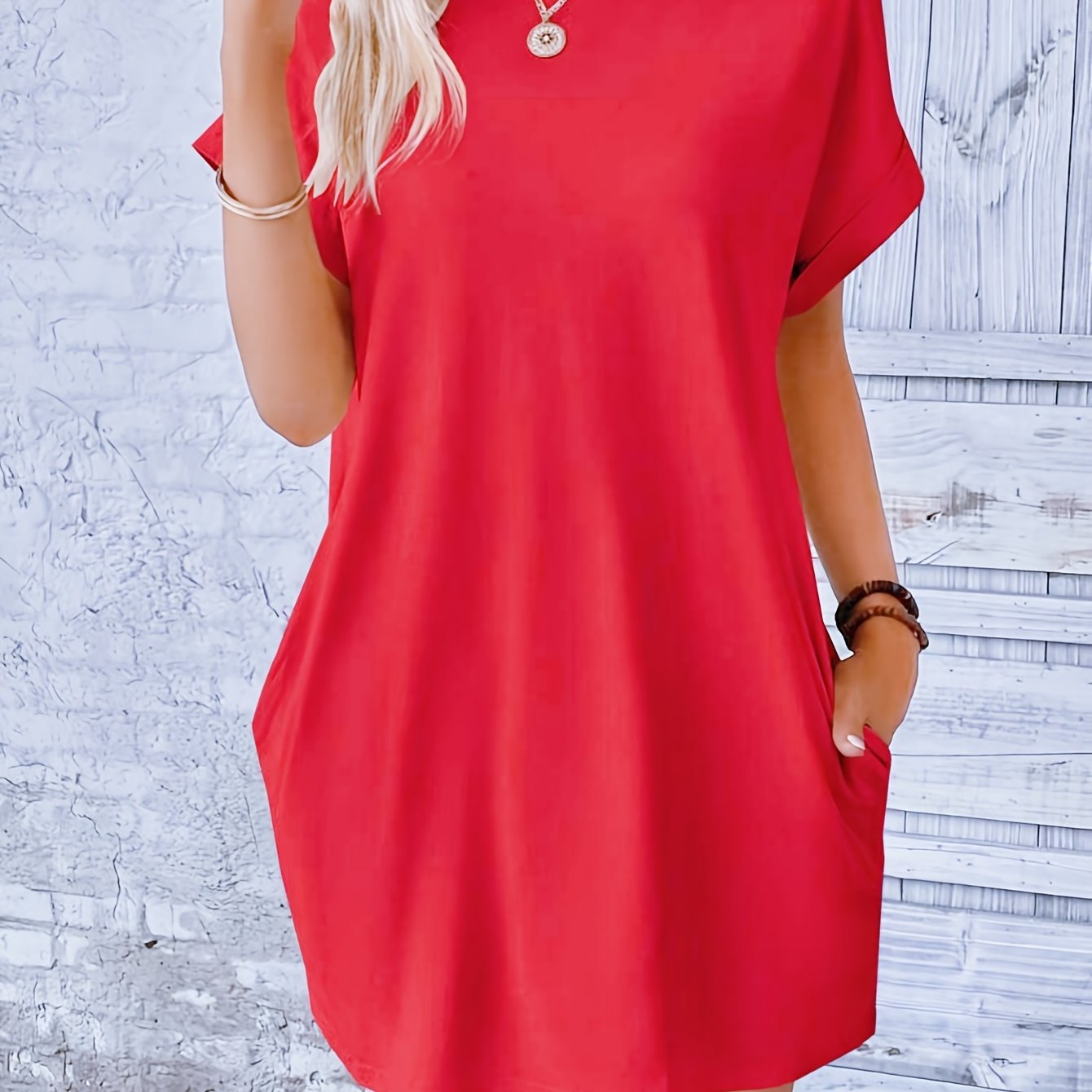 Lina – midi zomer jurk met ronde hals en handige zakken