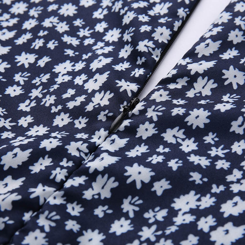 Lina – Gebloemde zomerjurk met V-hals en taille-accent