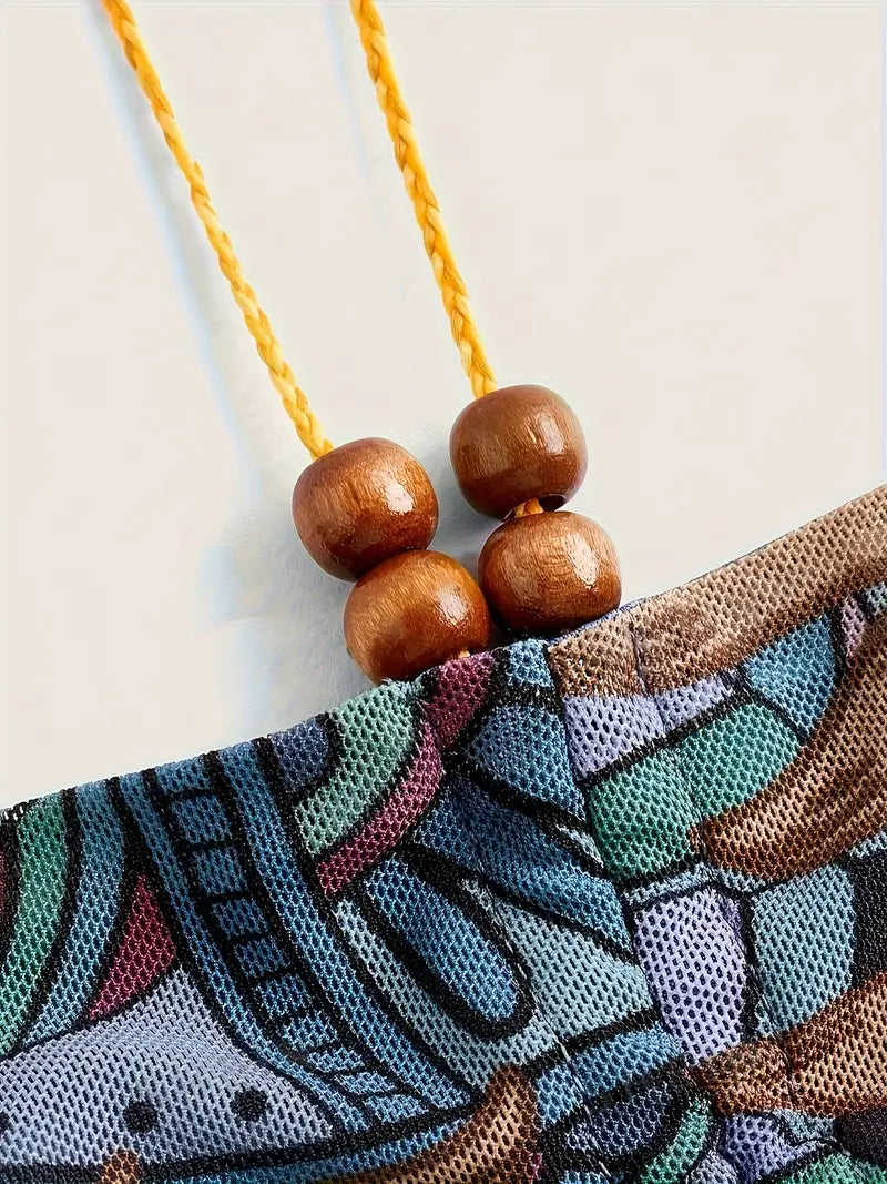 Luna – Haltertop met bohemian zonneprint en zakdoekzoom