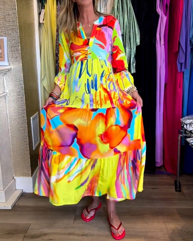 Lotte – Gele jurk met uitlopende mouwen elastische taille en speelse print