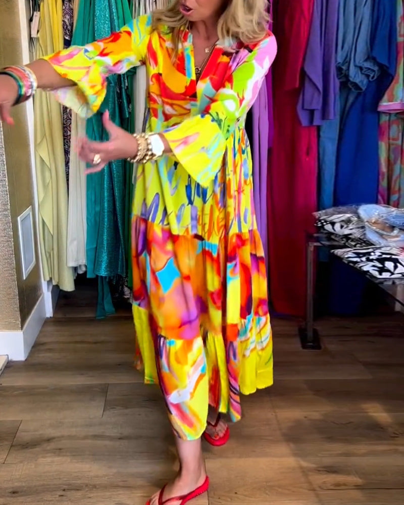 Lotte – Gele jurk met uitlopende mouwen elastische taille en speelse print