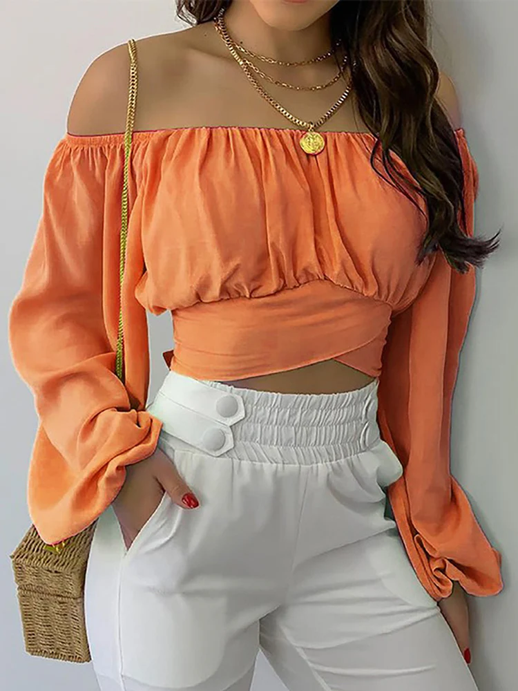 Luna – Off-shoulder crop top met ballonmouwen en geplooide borst