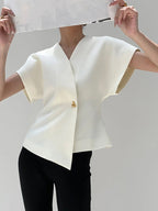Top met asymmetrische sluiting en korte mouw