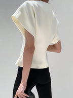 Top met asymmetrische sluiting en korte mouw