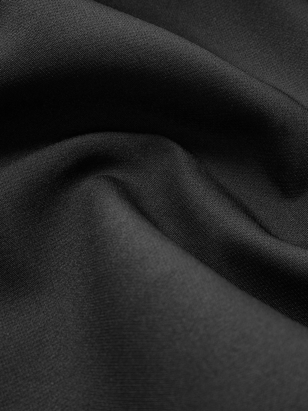 Top met asymmetrische sluiting en korte mouw
