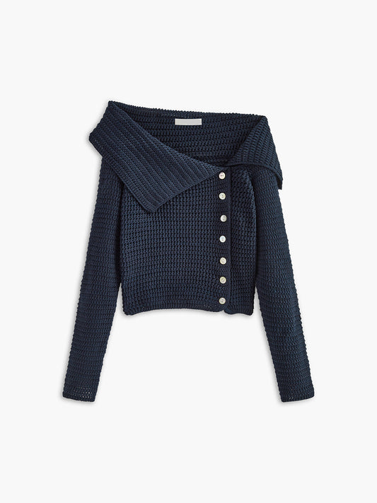 Sculpted – asymmetrische knit top met knopen en warme stof