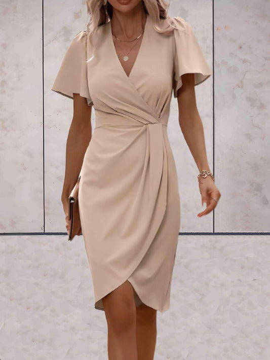 Sophia – Beige bloemenprint jurk met lange mouwen en ceintuur
