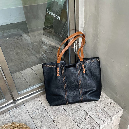 Seren – ruime schoudertas met zacht materiaal en tijdloos design