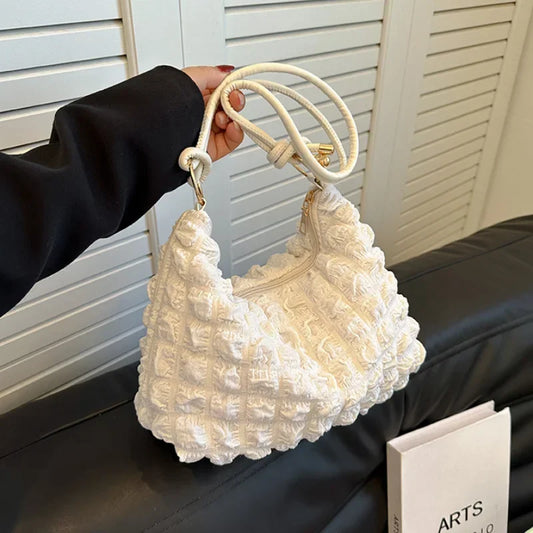 Elena – beige canvas tote met plooien en gewatteerde structuur