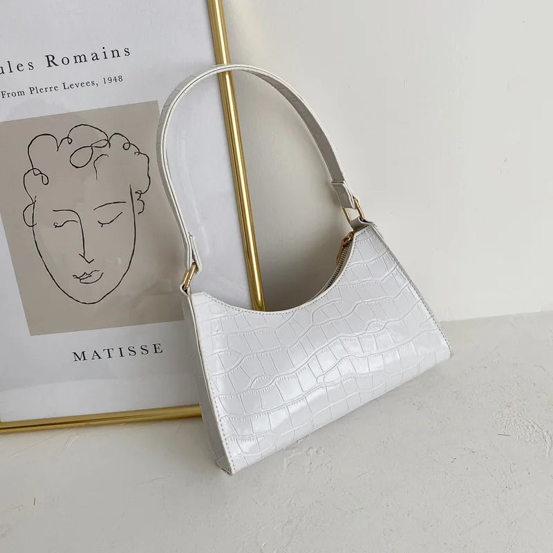 Romy – Retro Schoudertas Van Glad Leer