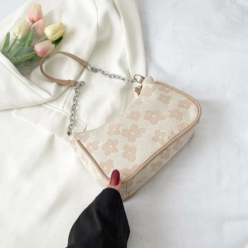 Elisa – handtas met bloemenmotief en vaste handgreep