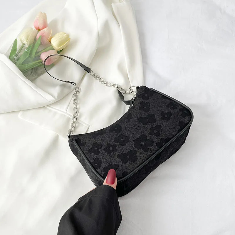 Elisa – handtas met bloemenmotief en vaste handgreep