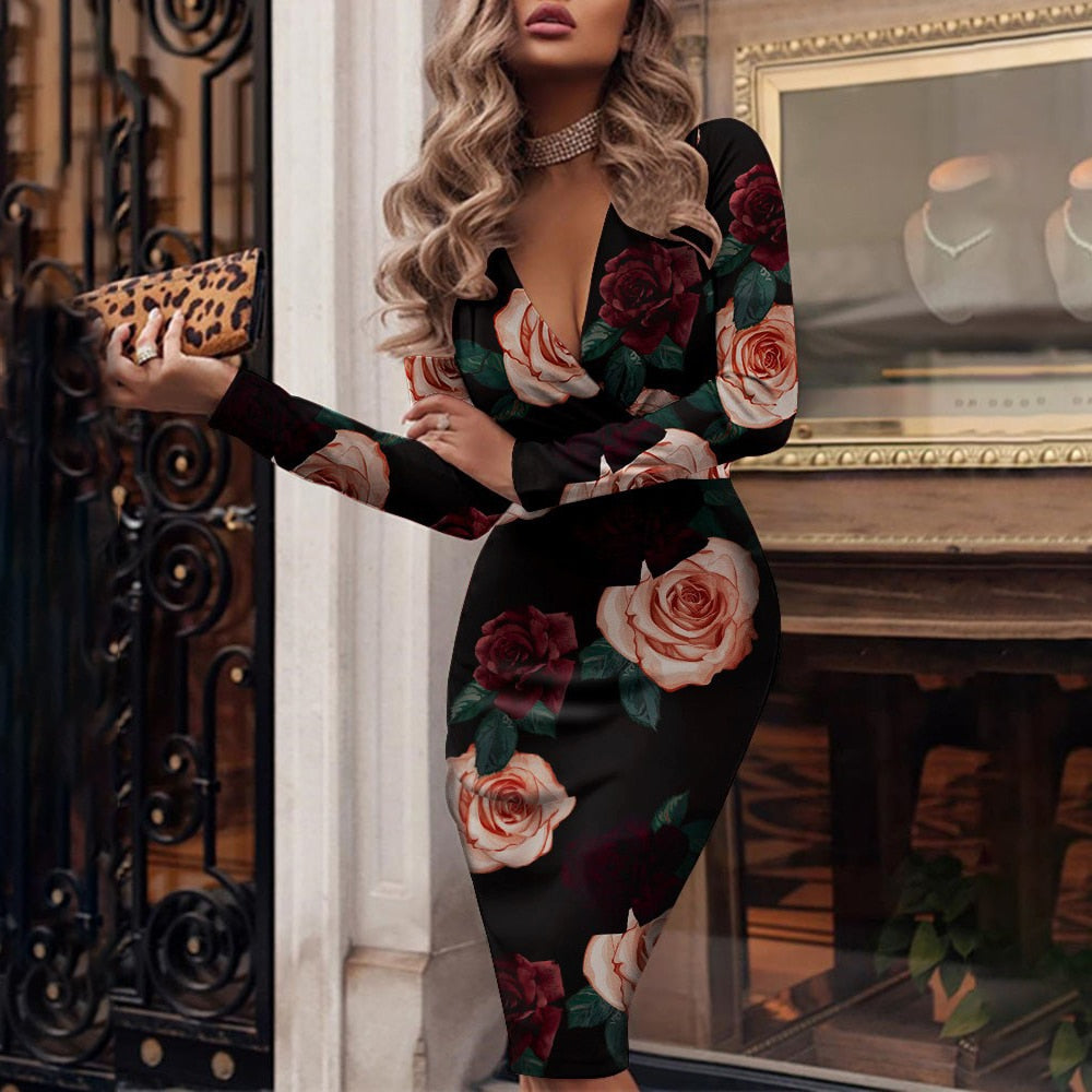 Celina – midi-jurk met pailletten en diepe V-hals