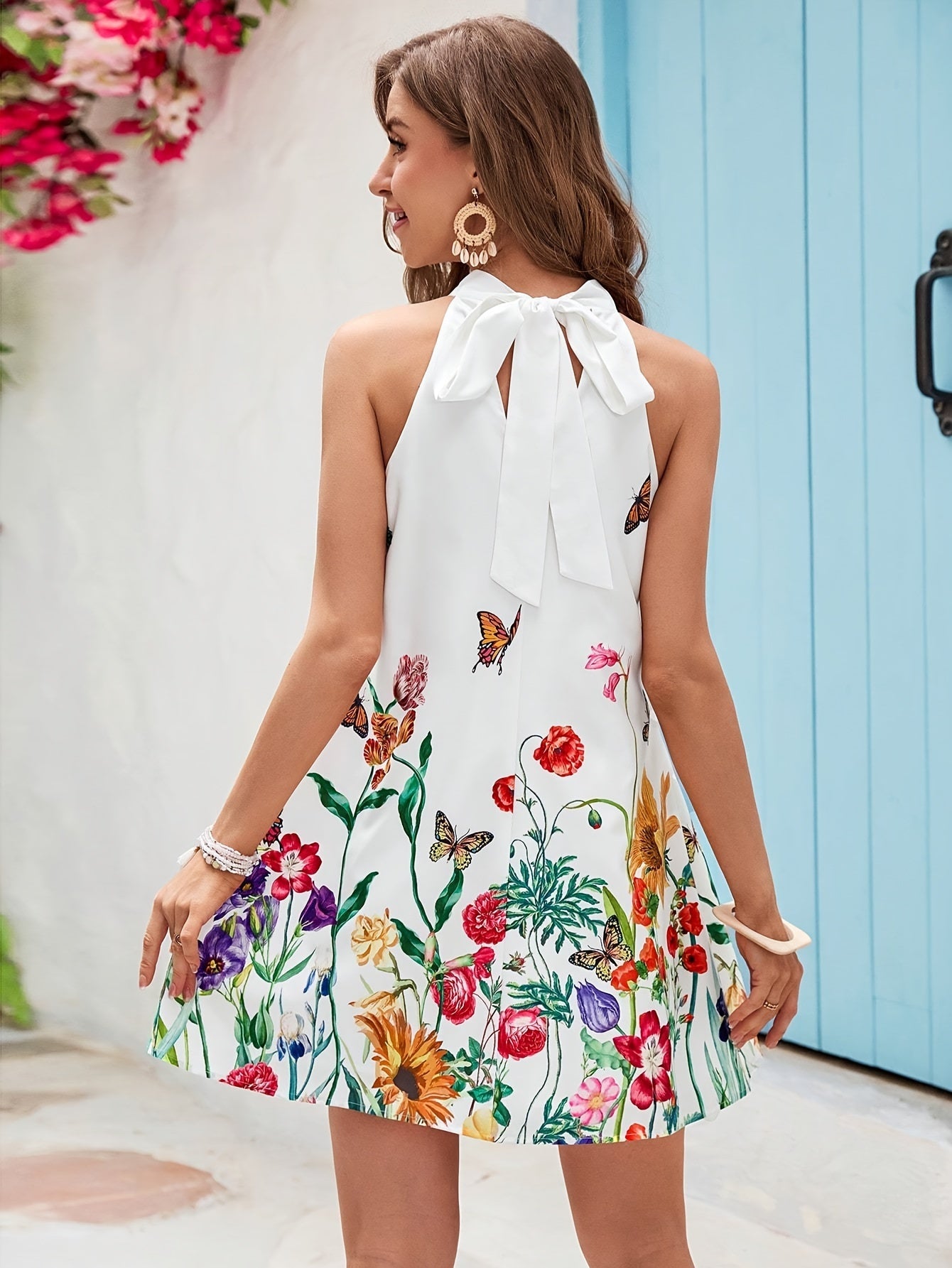 Helena – Zomerse mini halterjurk met bloemenprint