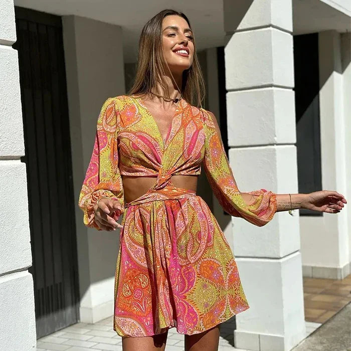 Elina – Mini zomerjurk met boho-print en open rug