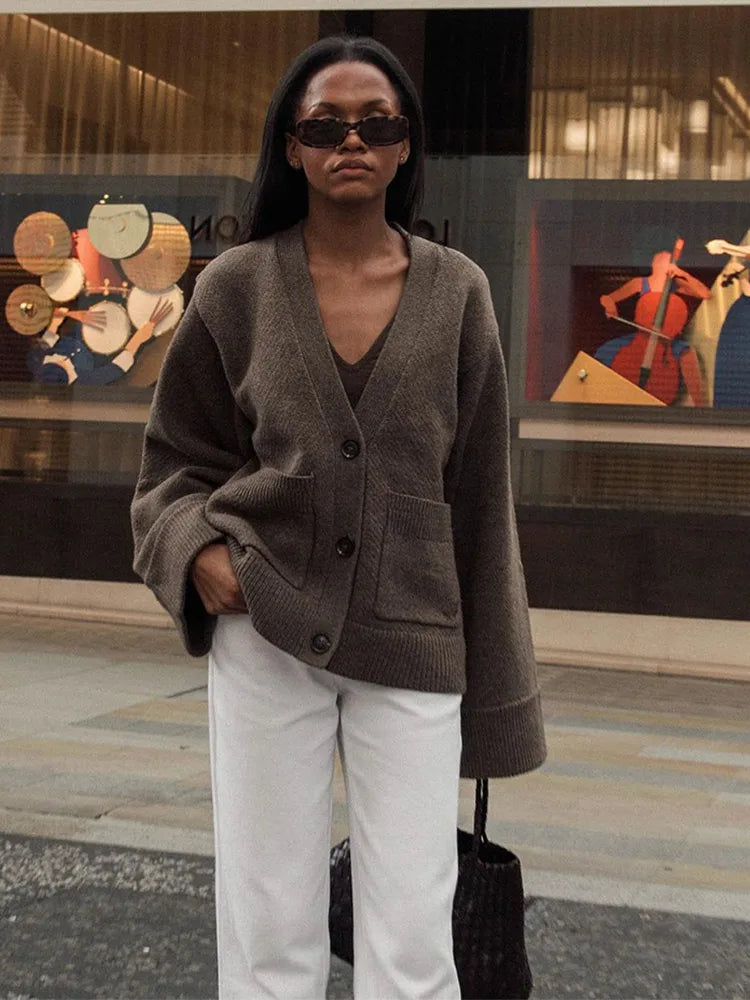 Romy – cardigan vest met diepe hals en steekzakken