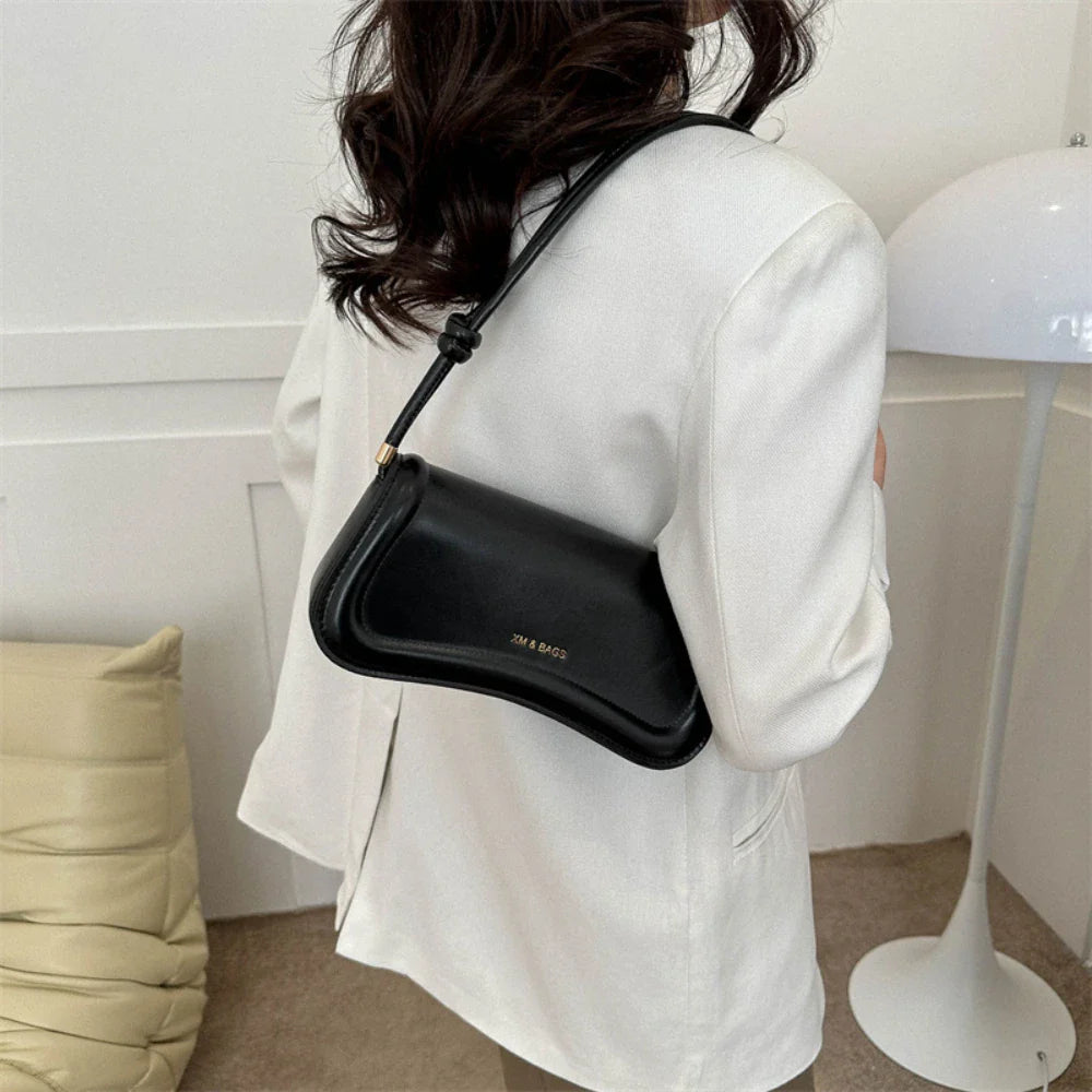 Lynn – pu crossbody handtas met verstelbare band